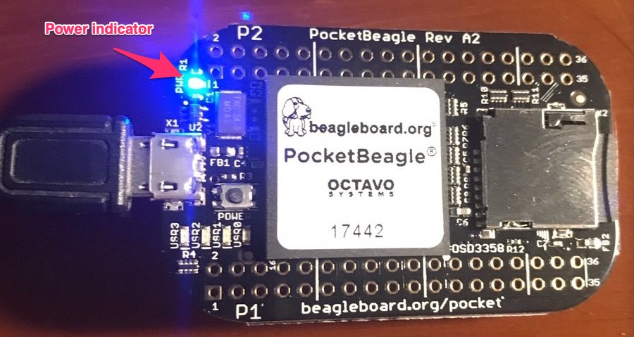 A photo showing the single power indicator lighting up on the PocketBeagle
